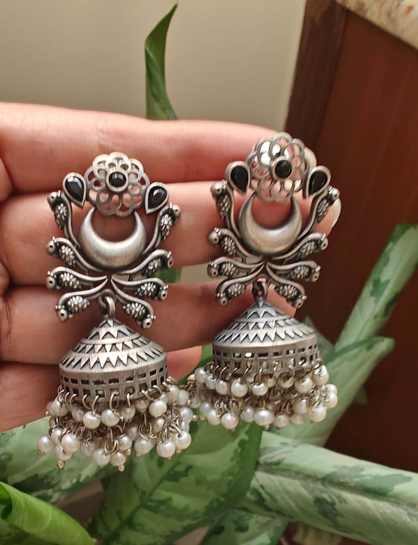 Jhumki's with pearls on peacock motif