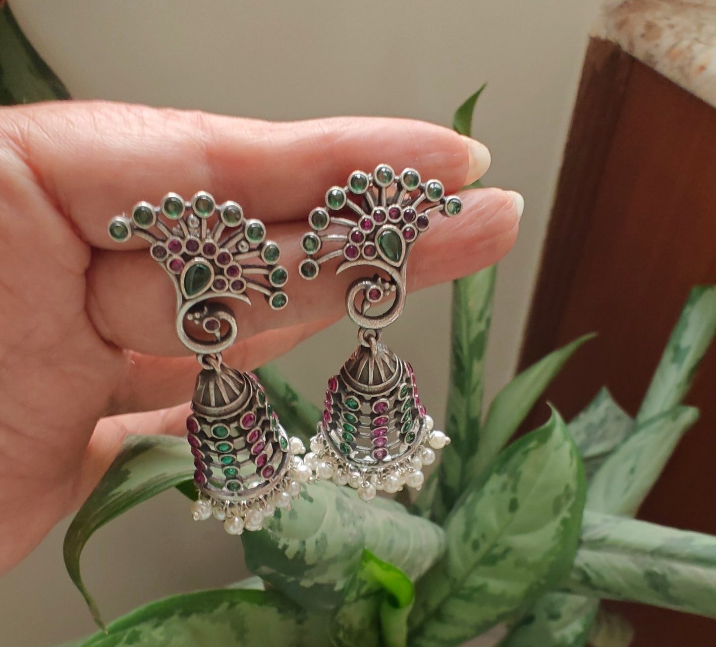 Earrings with mayur stud and stones