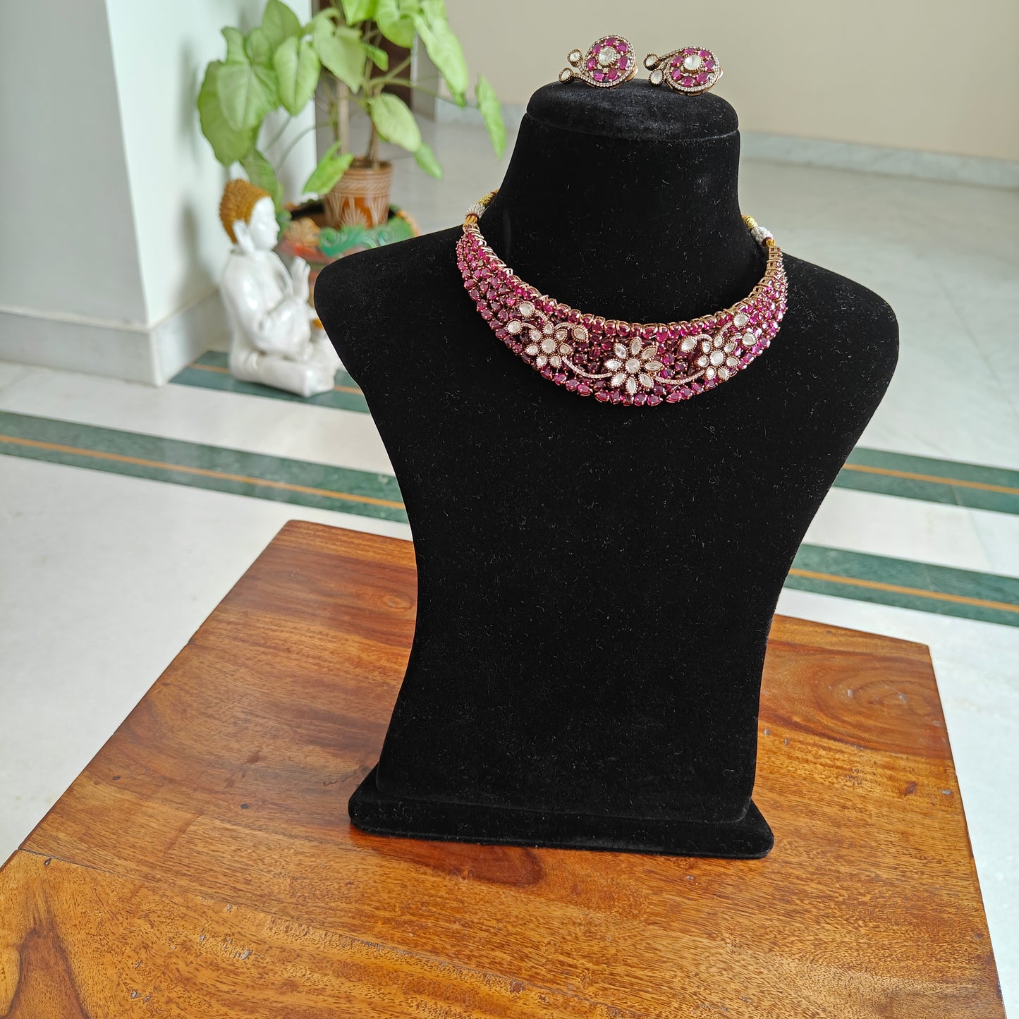 Swagata set with Ruby red stones and moissanite flowers on top