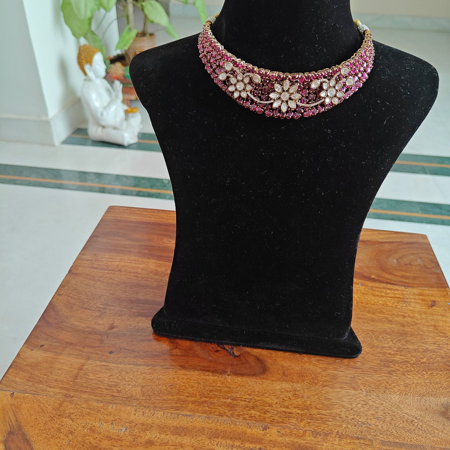 Swagata set with Ruby red stones and moissanite flowers on top