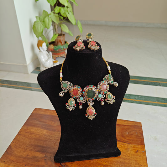 Ulupi set with multicolour stones and navratan around
