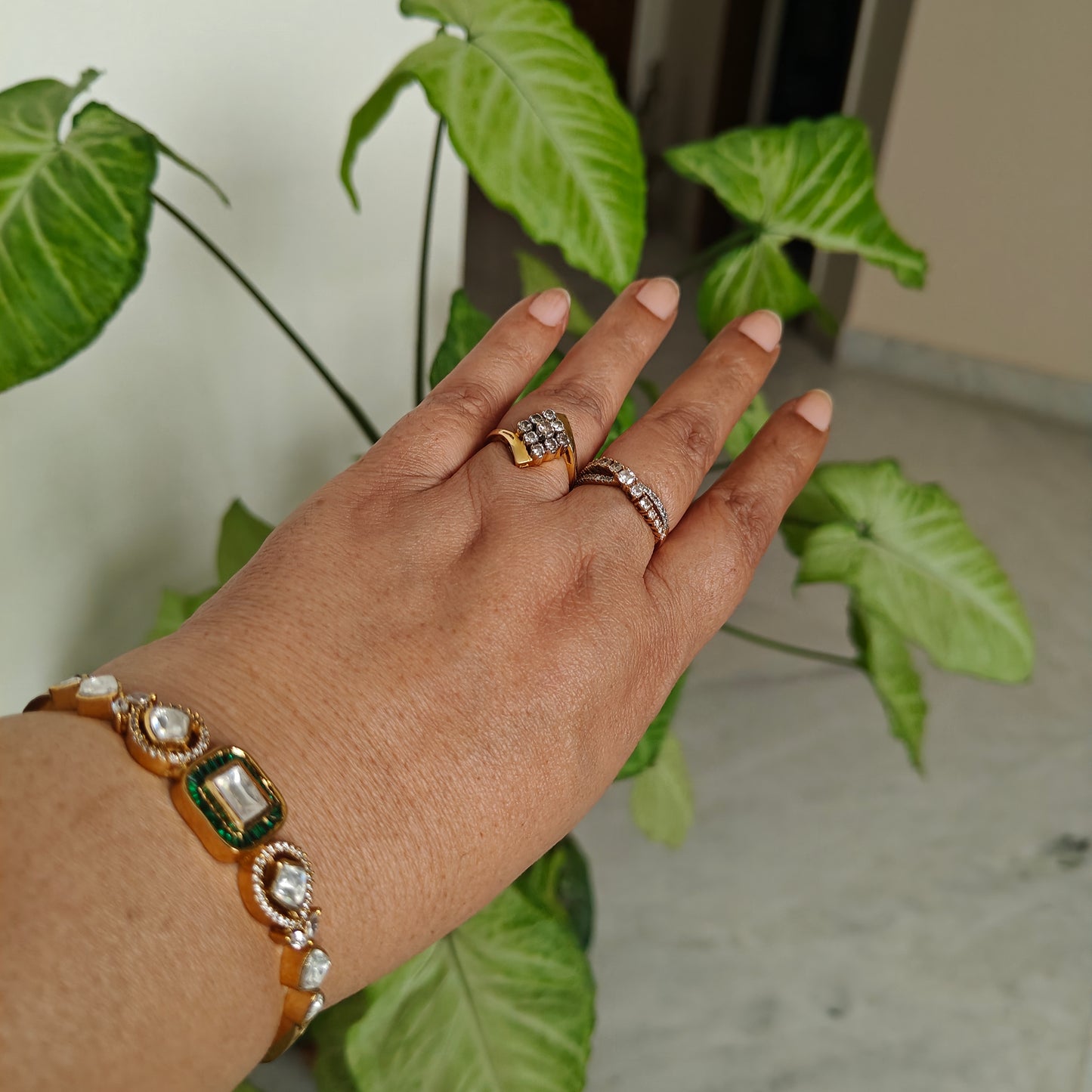 Moissanite kada with green/pink stone around centre piece