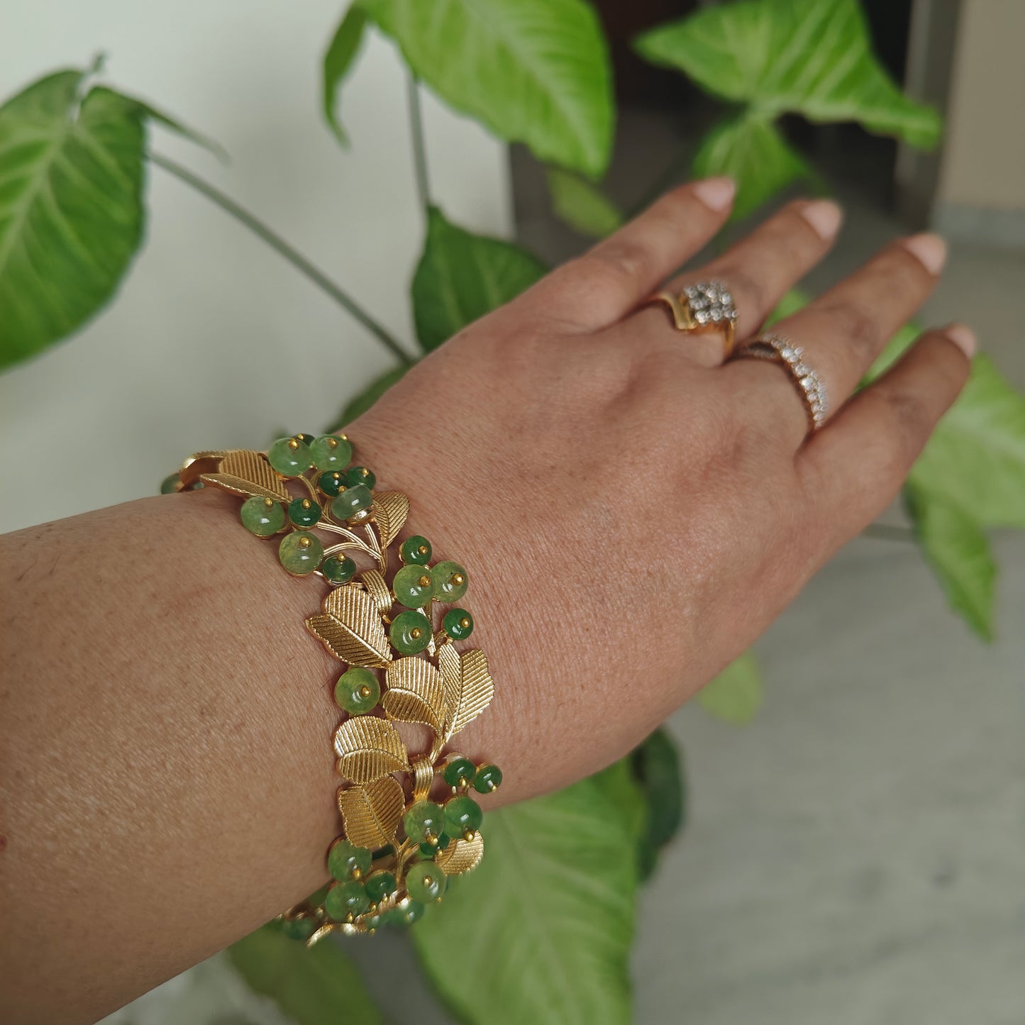 Bracelet with leaves and stone flowers
