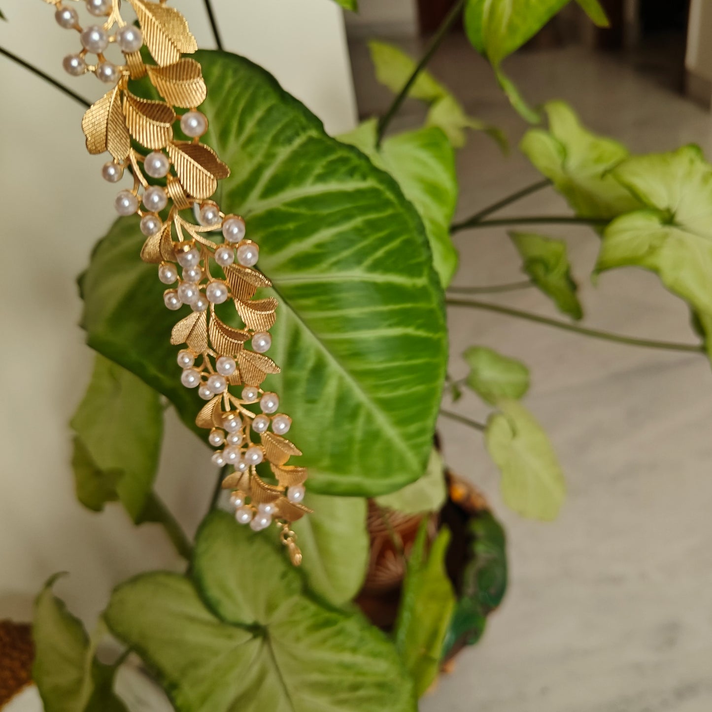 Bracelet with leaves and stone flowers