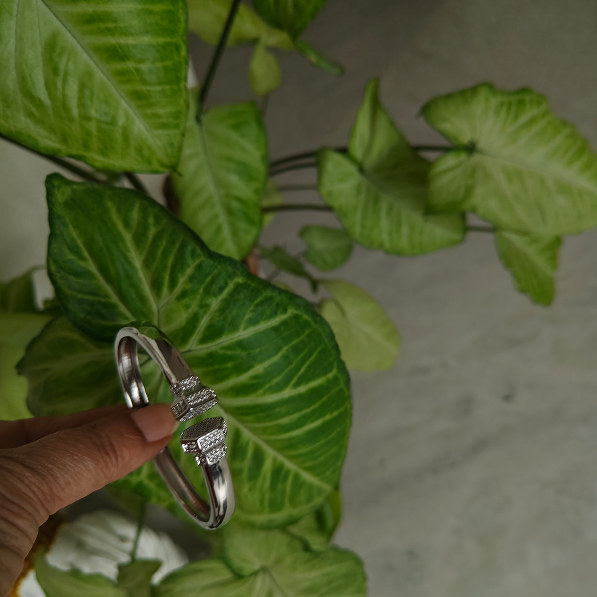 Bracelet with cz on end of rombus