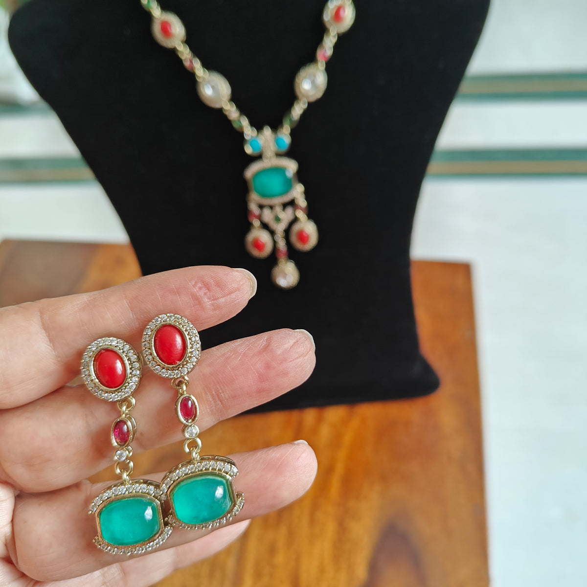 Surama long set with multicolour stones and pendent below