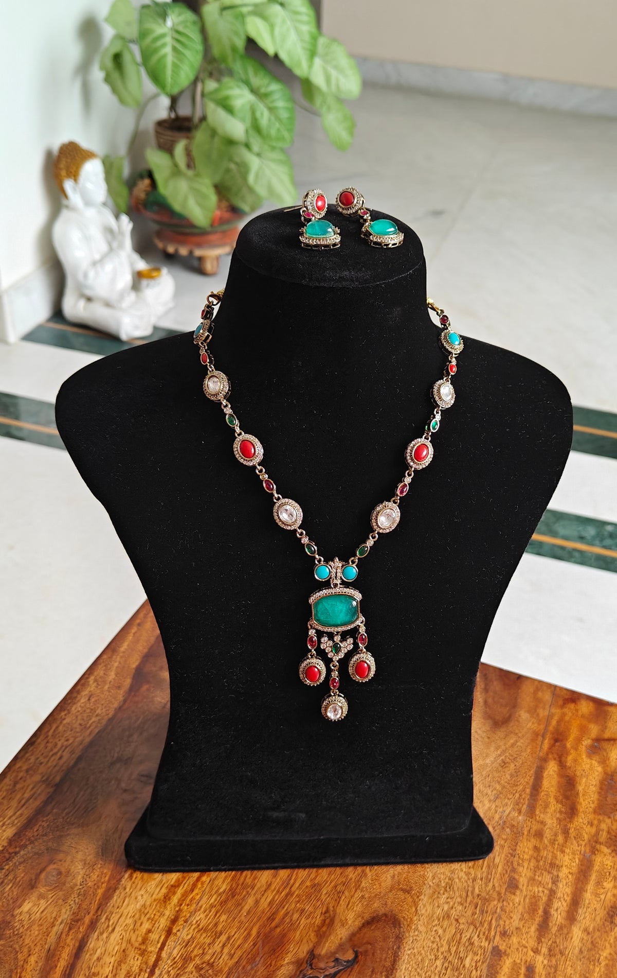 Surama long set with multicolour stones and pendent below