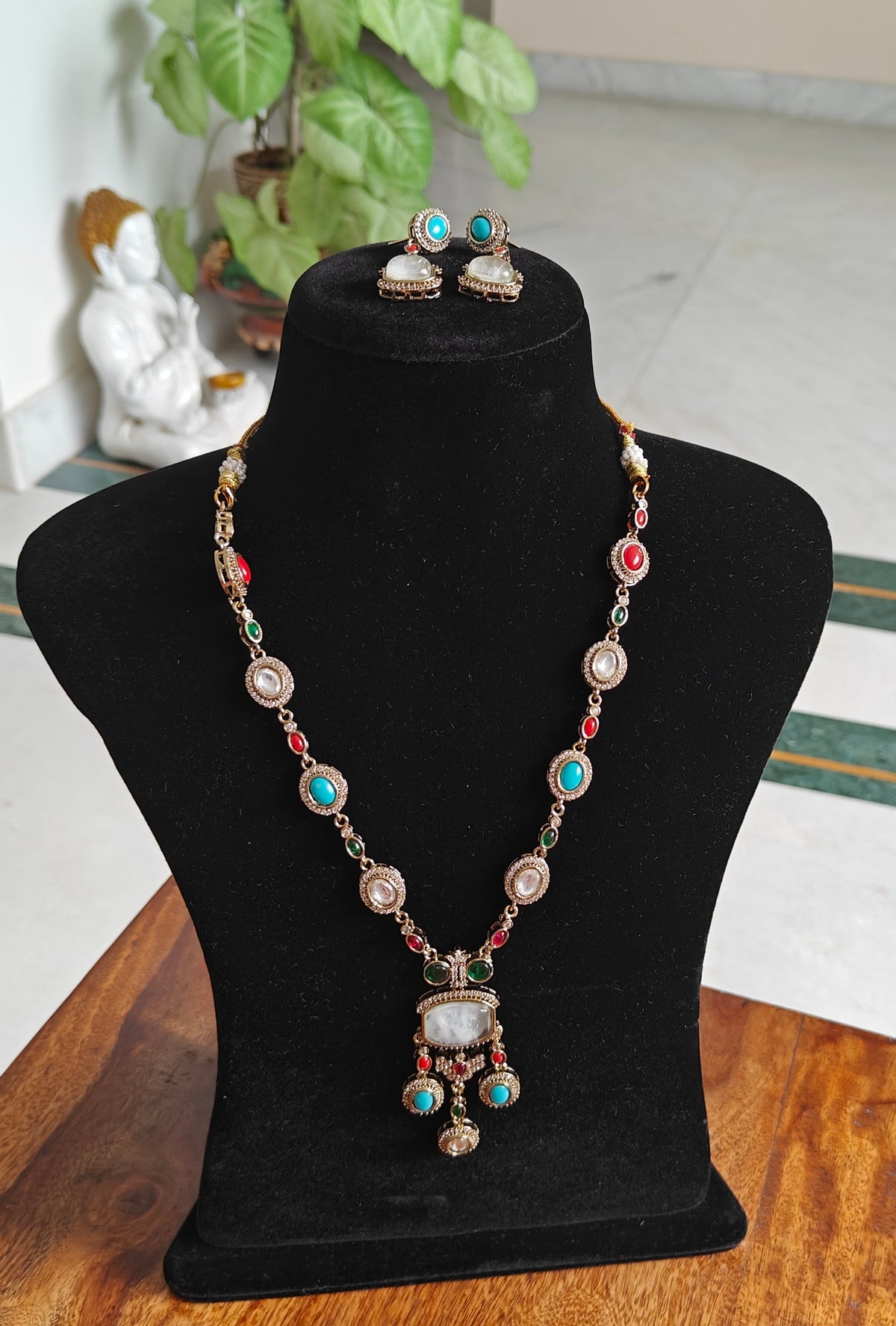 Surama long set with multicolour stones and pendent below