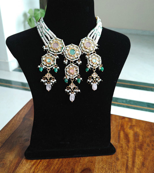 Rujula set with kundan and stone pieceson pearl strings