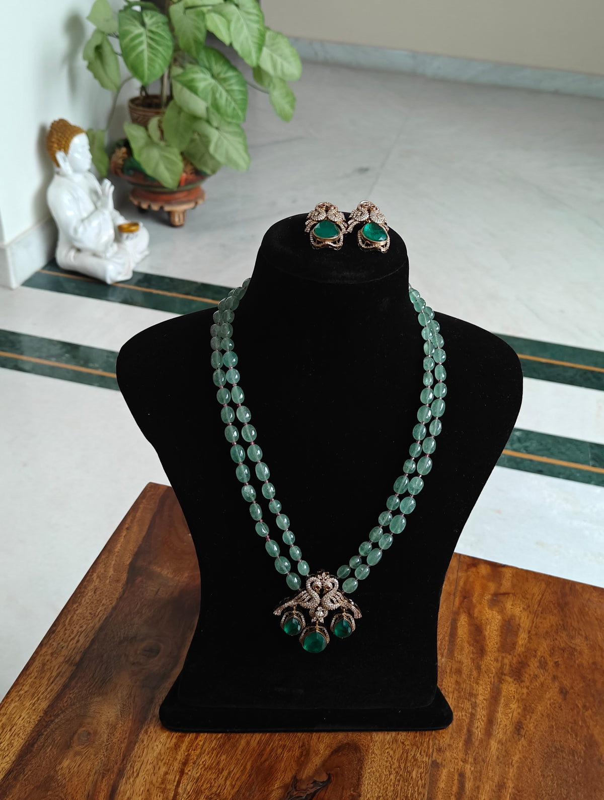 Rachna set with stone strings and peacock pendant