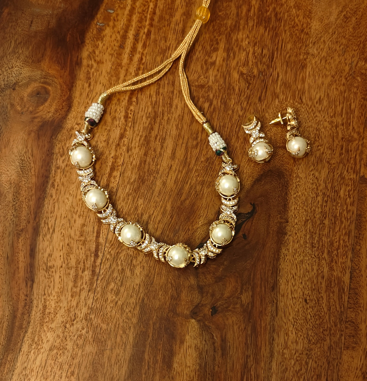 Priyal set with encased stones