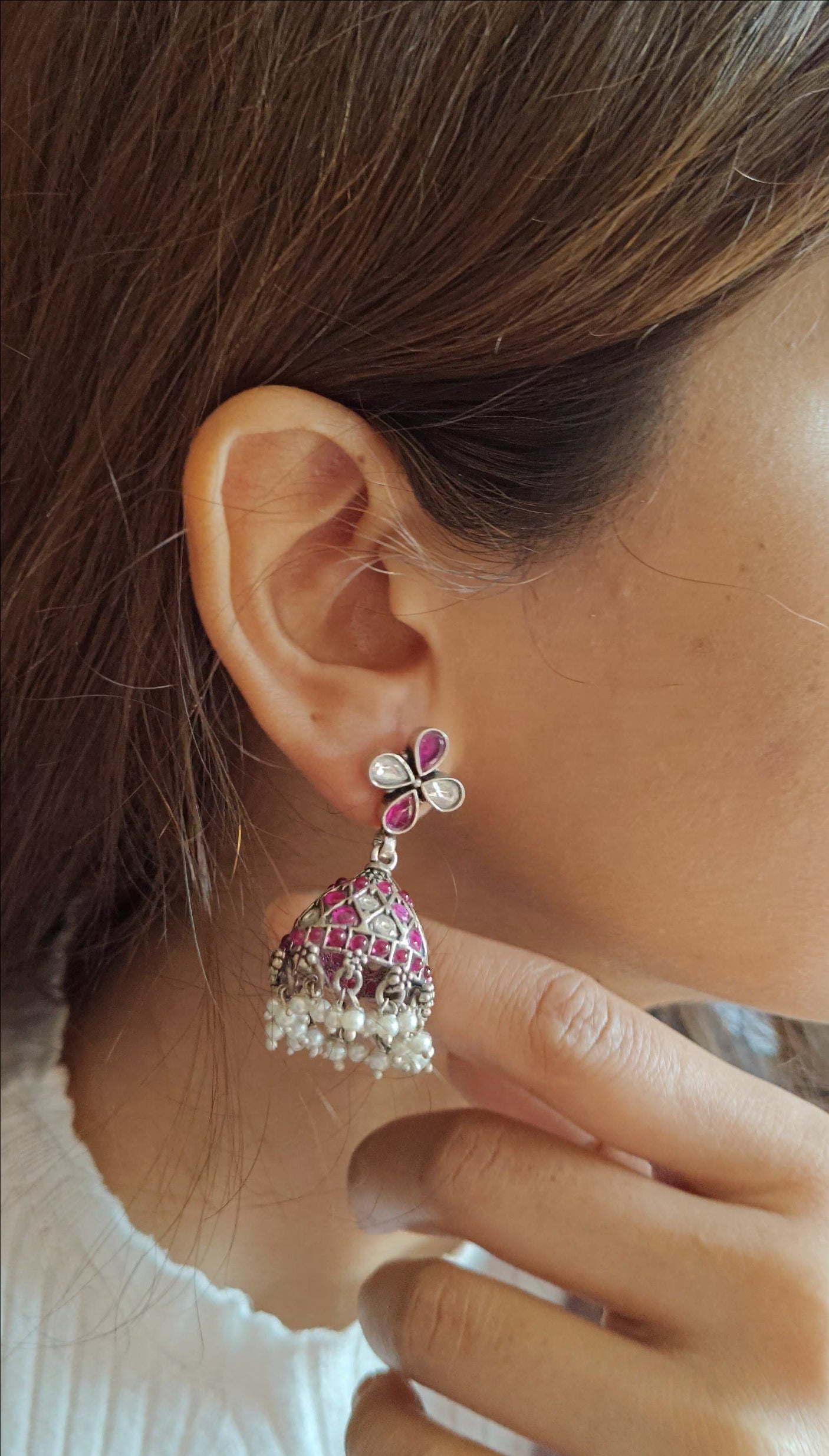 Antique silver jhumkas (earrings) with red and white stones