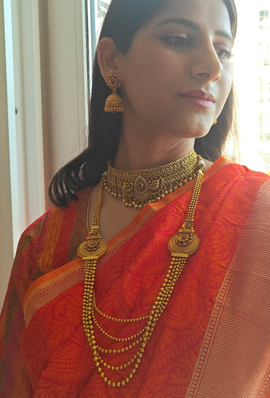 Sameena necklace set with golden bead chains and flower motifs