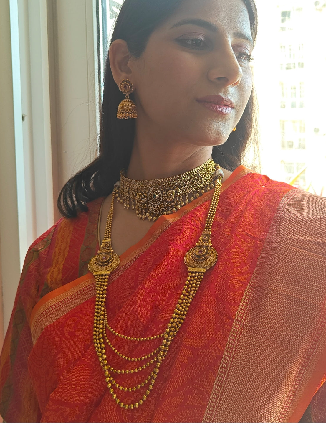 Putul choker with intricate work and peacock motifs