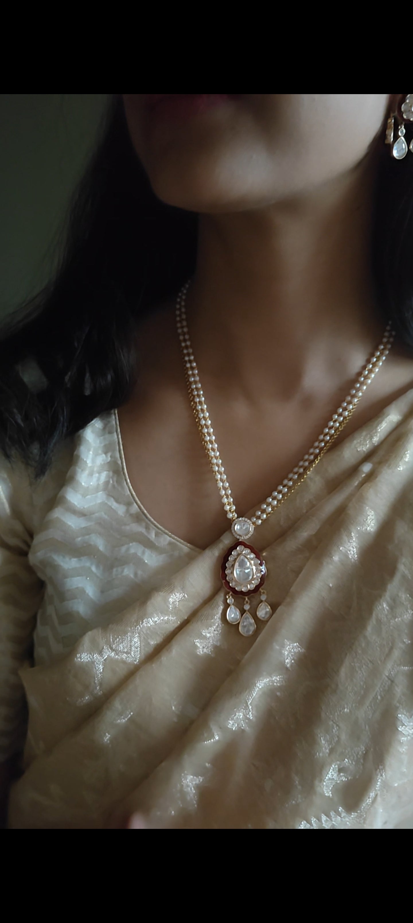 Quasar set with moissanite pendant on pearls and gold chain