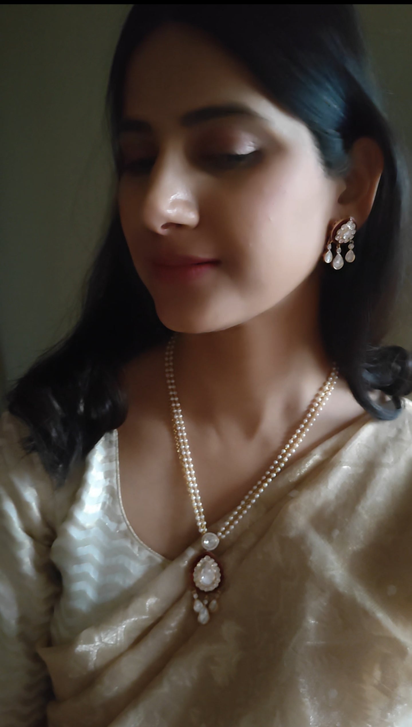 Quasar set with moissanite pendant on pearls and gold chain