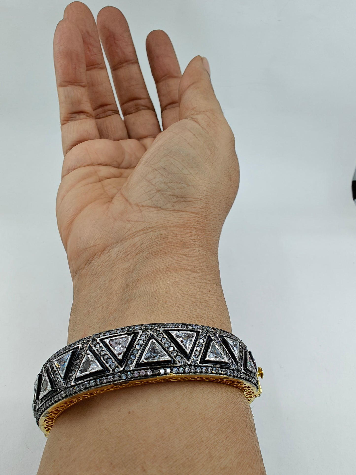 Kara( bangle) with triangular kundan and CZ on black meenakari