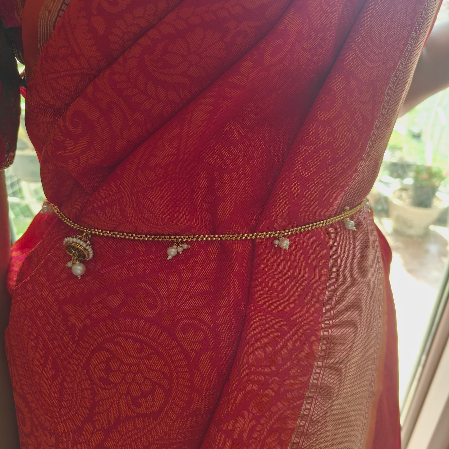 Golden belt with pearls and half borla