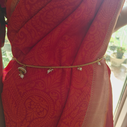 Golden belt with pearls and half borla