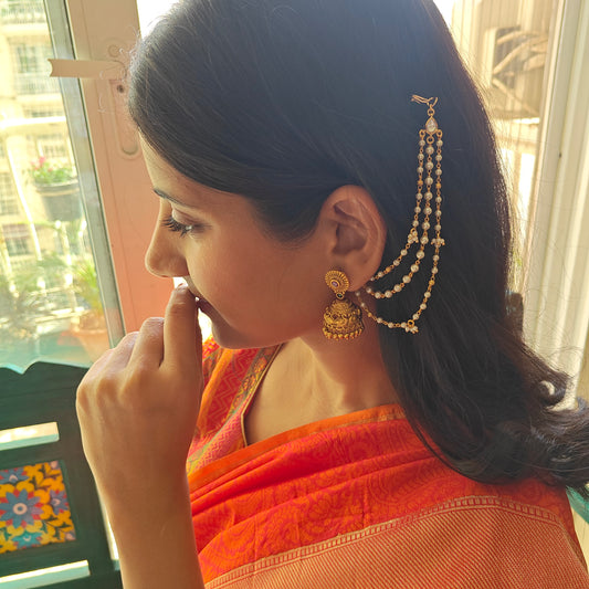 Pearl chain with moissanite on end and small pearl hangings