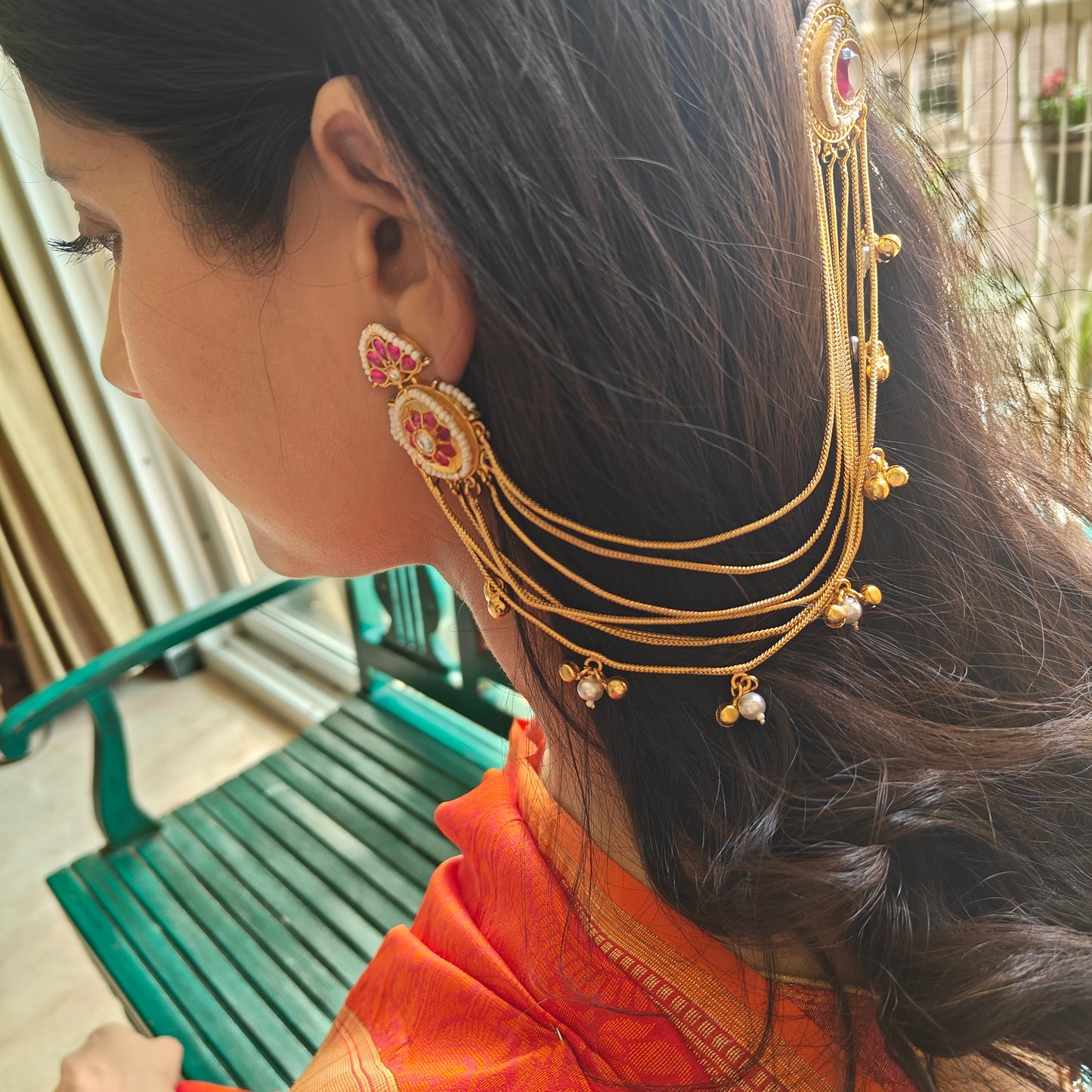Earrings with earchains and studs on both sides