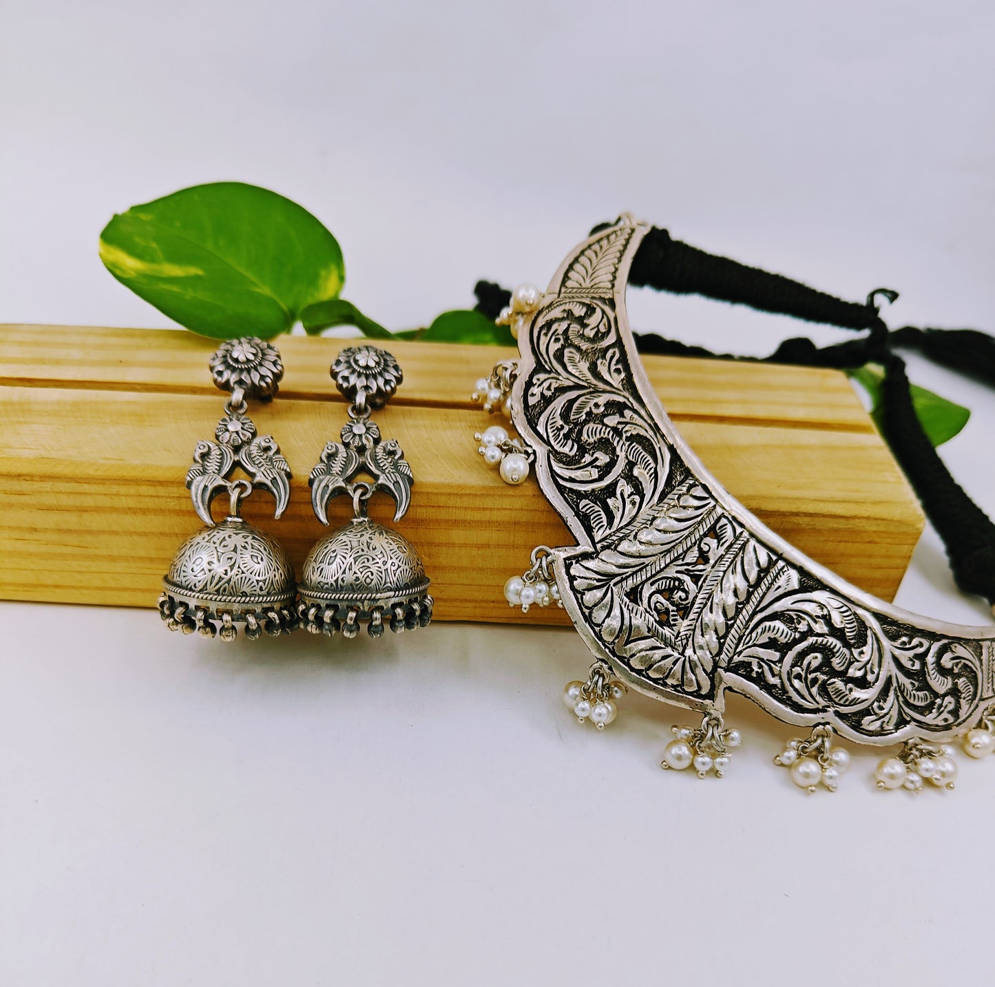 Silver jhumkas earrings with parrot design