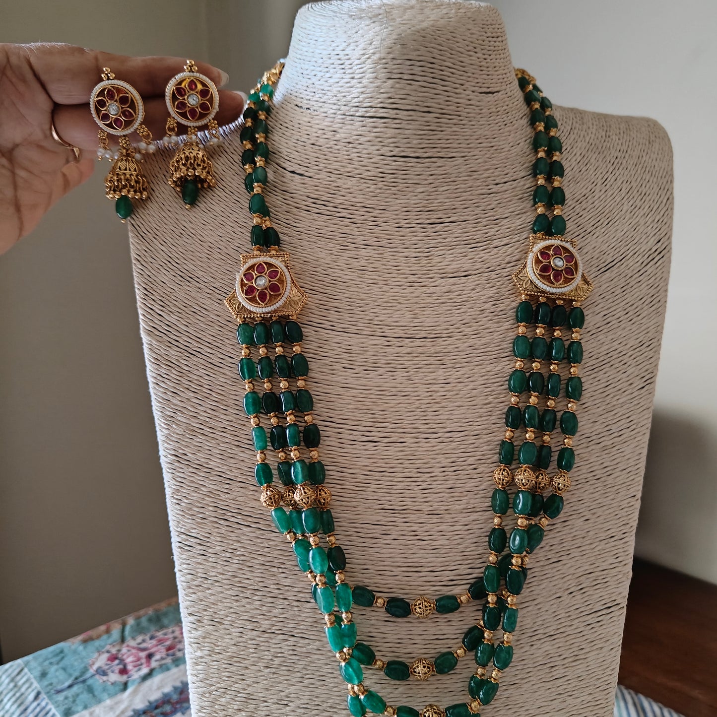 Riti emerald green stone and golden beads necklace set