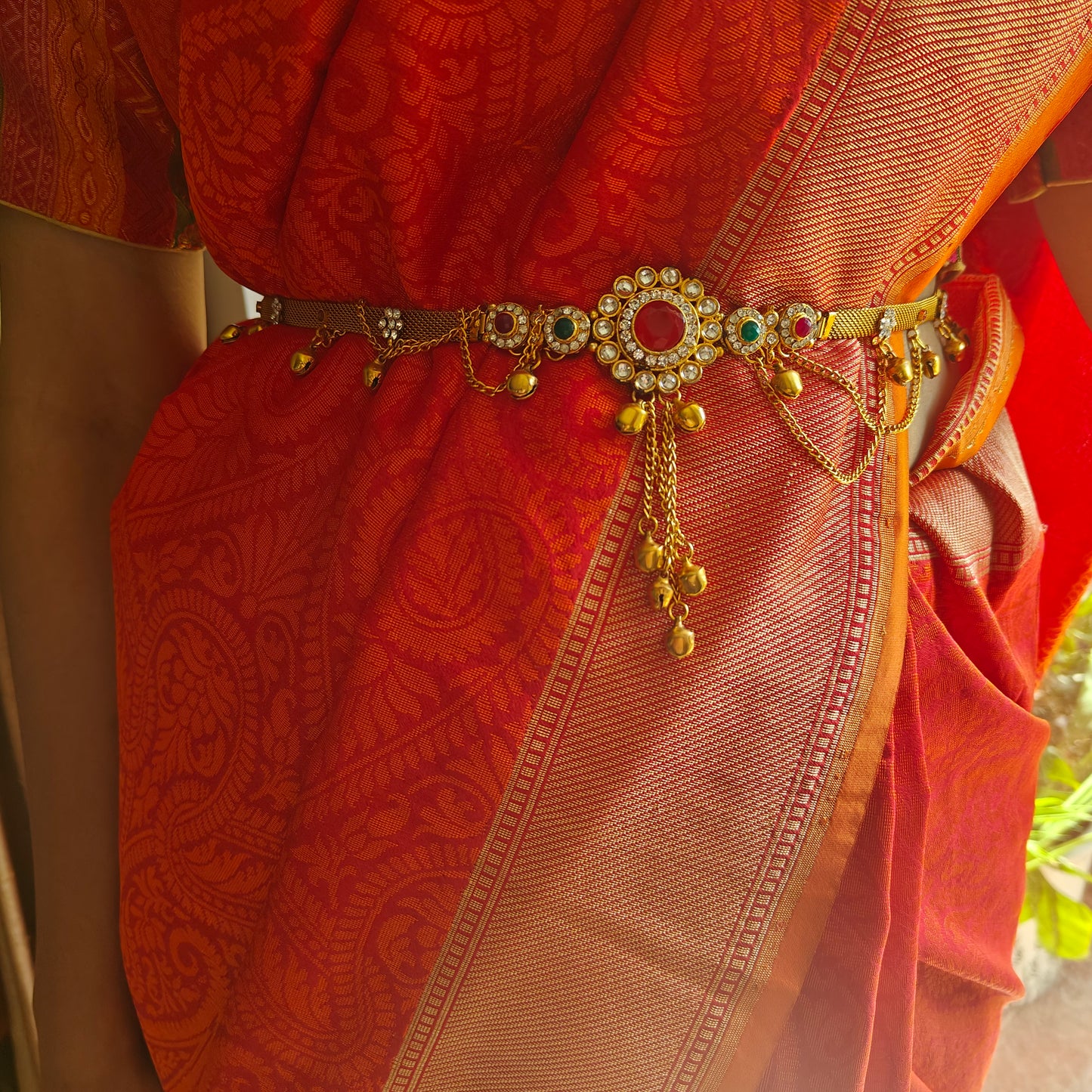 Belt with red/clear stone in centre and hangings all around