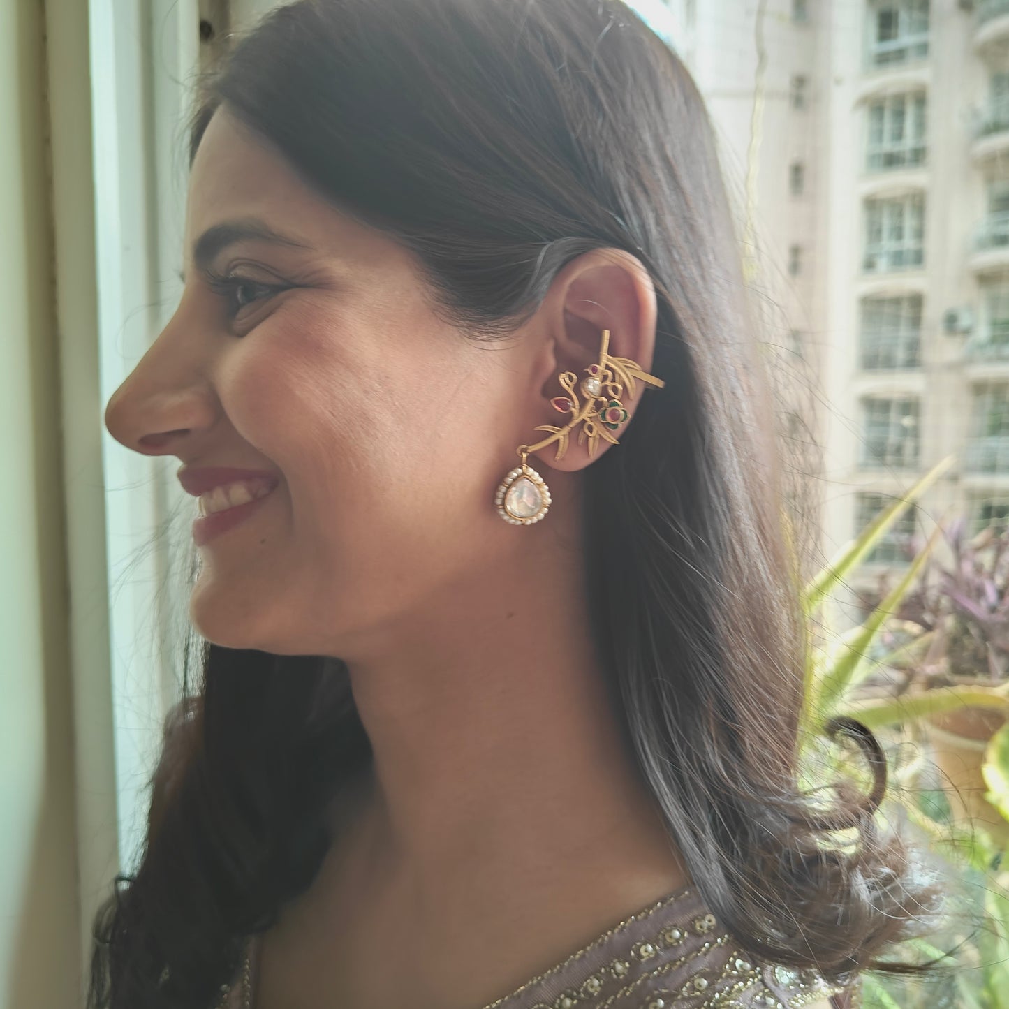 Earcuffs(earrings) with a moissanite drop on a twig earpiece