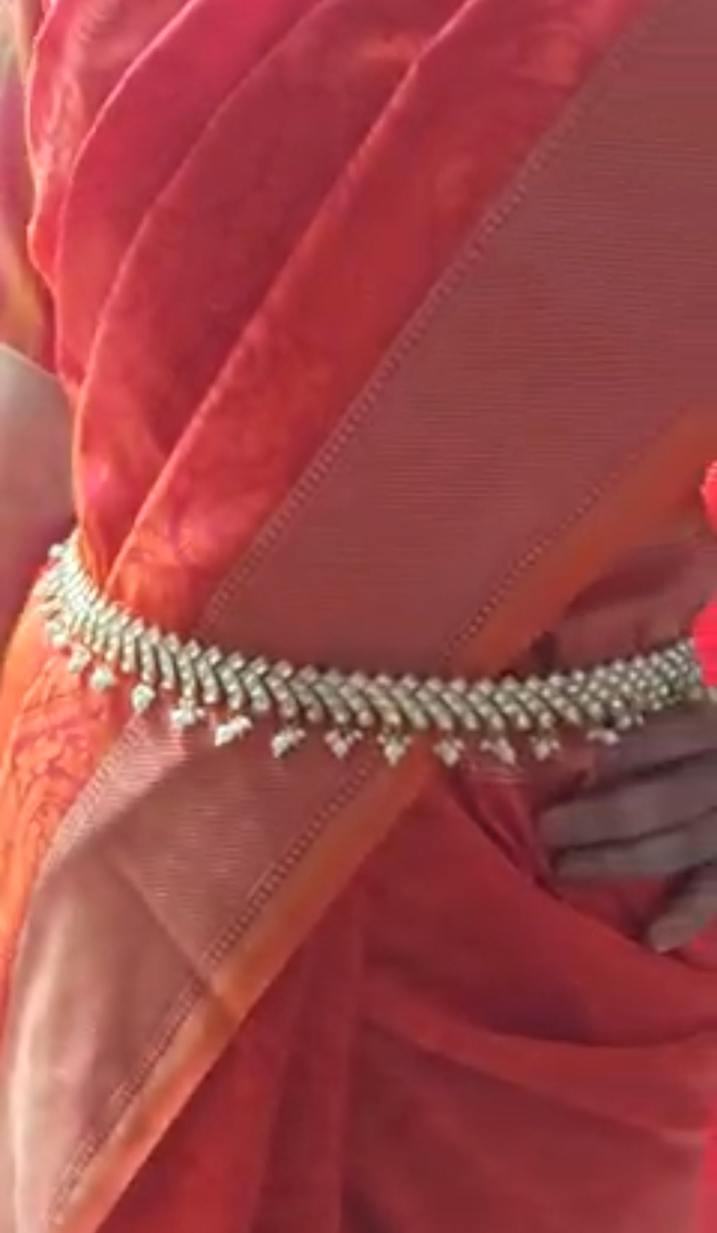 Golden broad belt with kundan pieces and pearl hangings