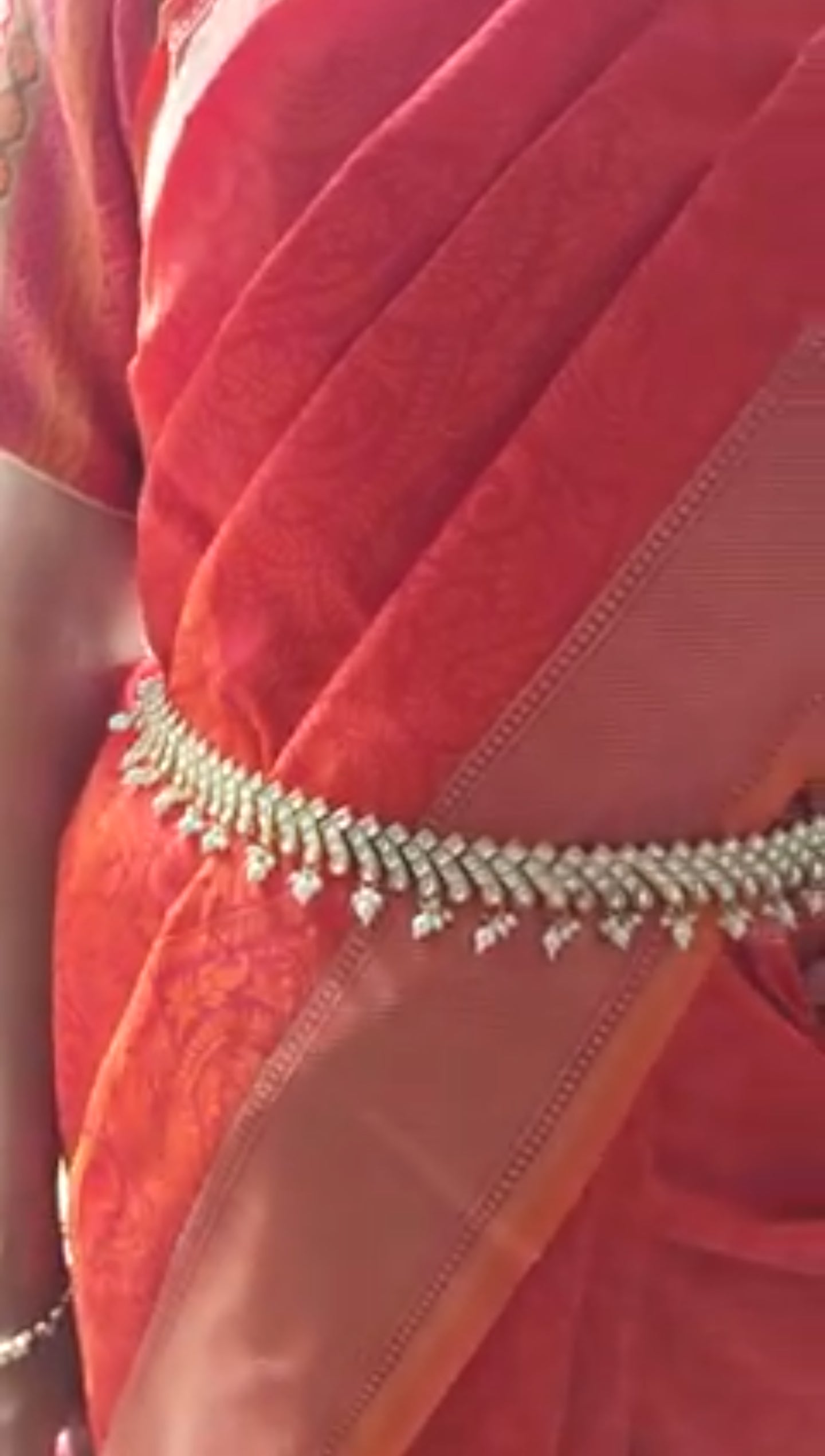 Golden broad belt with kundan pieces and pearl hangings