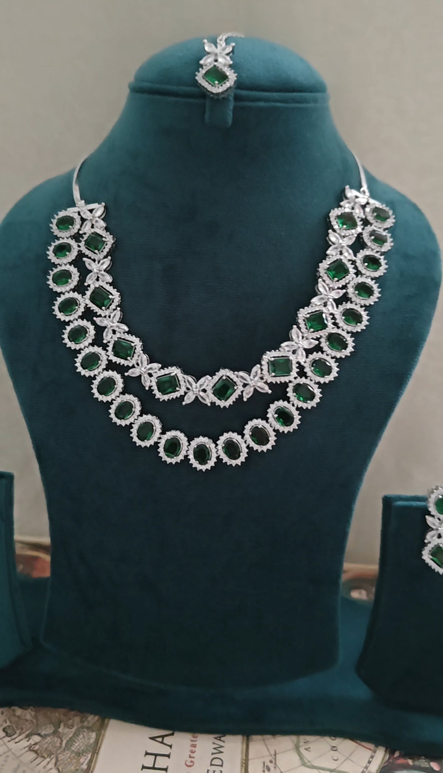 Emerald green stone and CZ set with maang Tikka