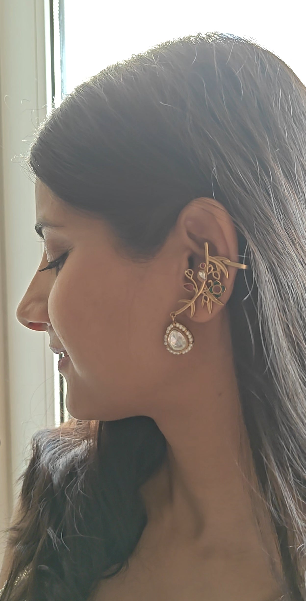 Earcuffs(earrings) with a moissanite drop on a twig earpiece