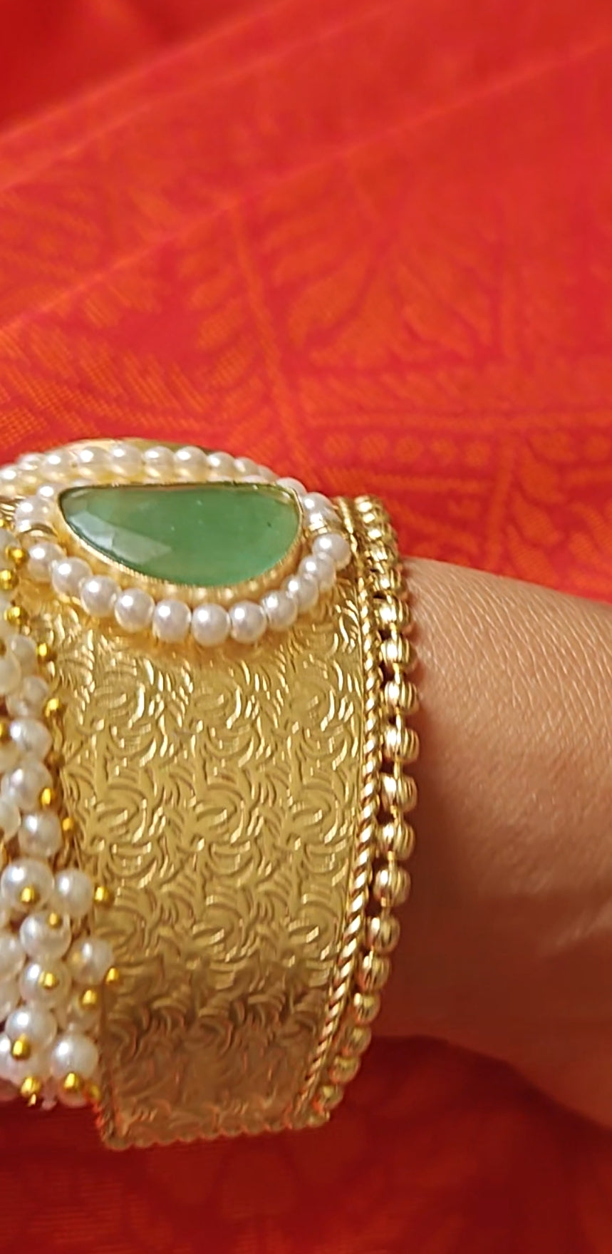 Golden Kara with navratan stones and pearls
