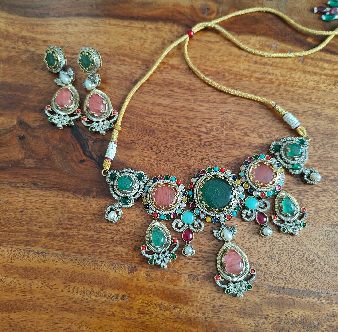 Ulupi set with multicolour stones and navratan around