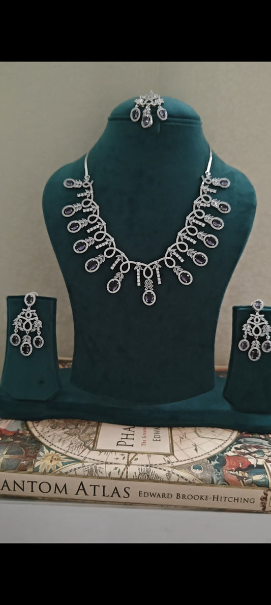 Delicate amythest and Cz set
