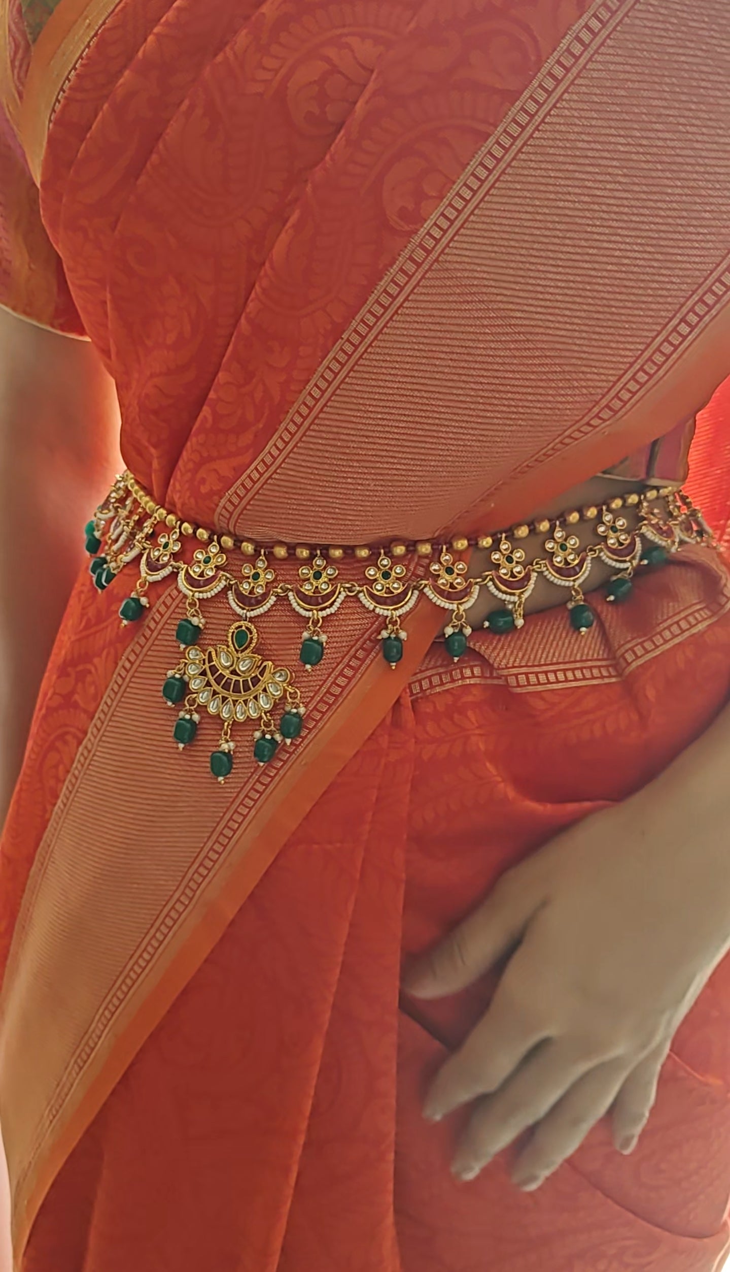 Golden belt with kundan,pink stones and green stone hangings