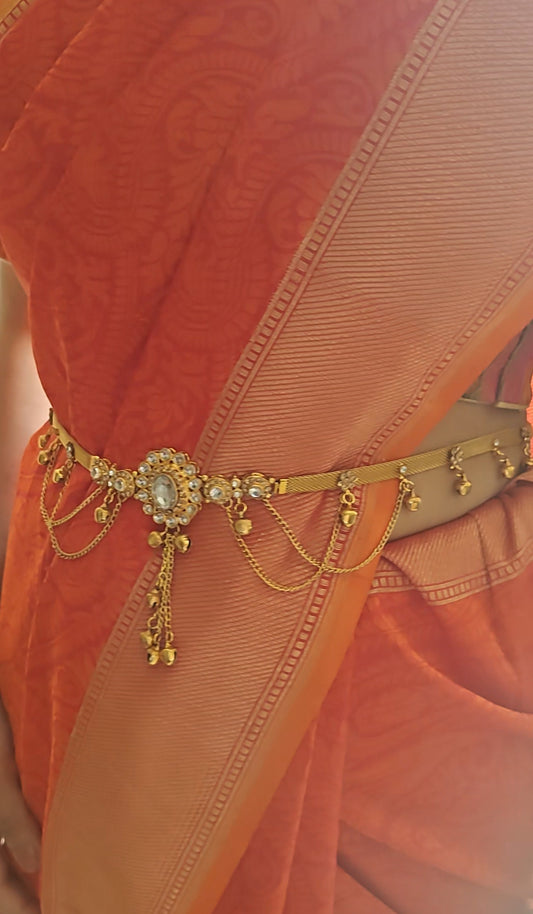 Belt with red/clear stone in centre and hangings all around