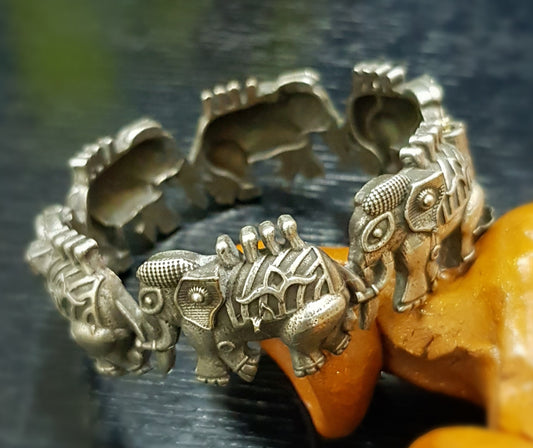 Elephants marching bangle in silver finish