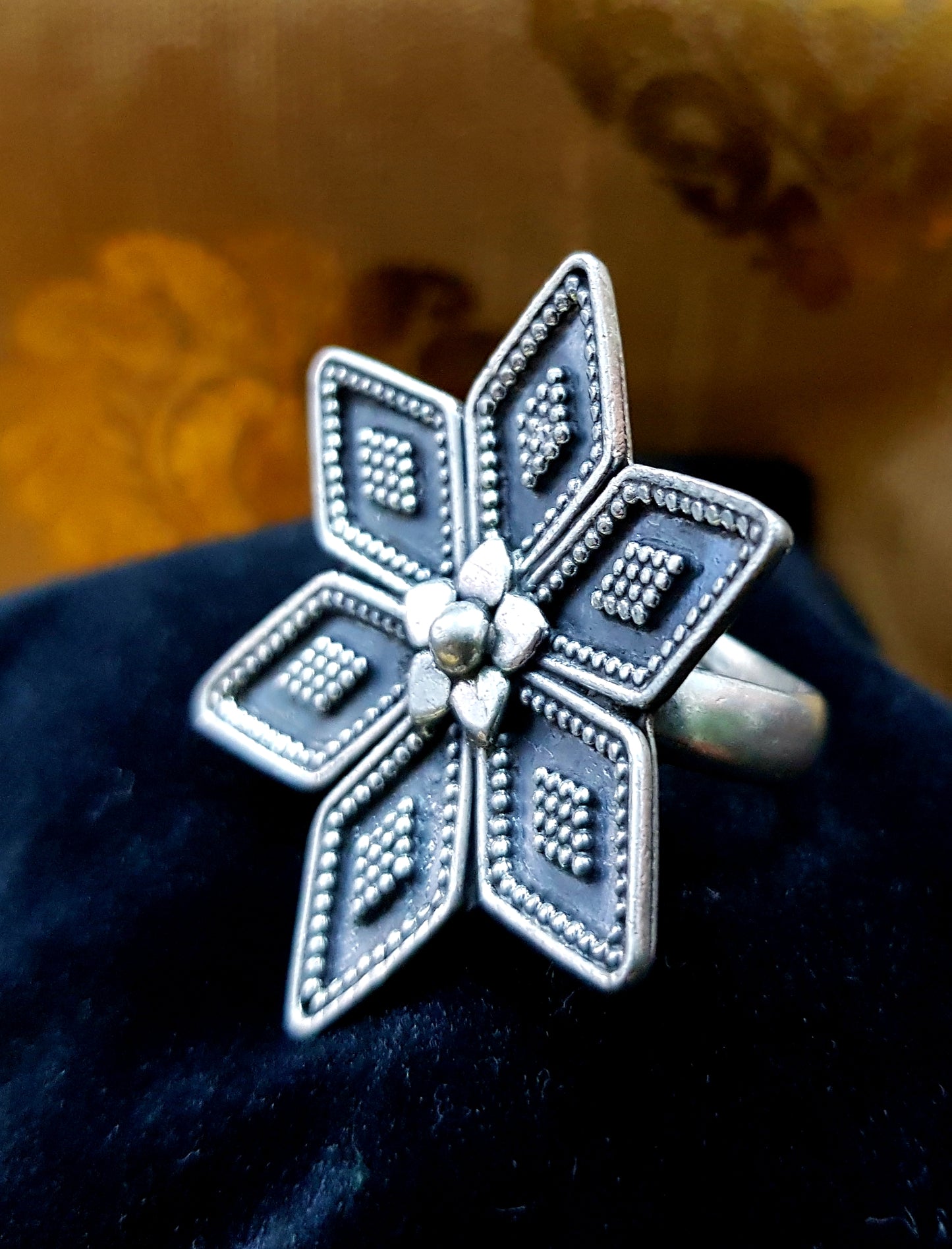 Silver star shaped antique ring