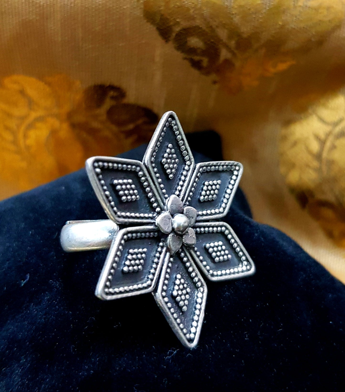 Silver star shaped antique ring