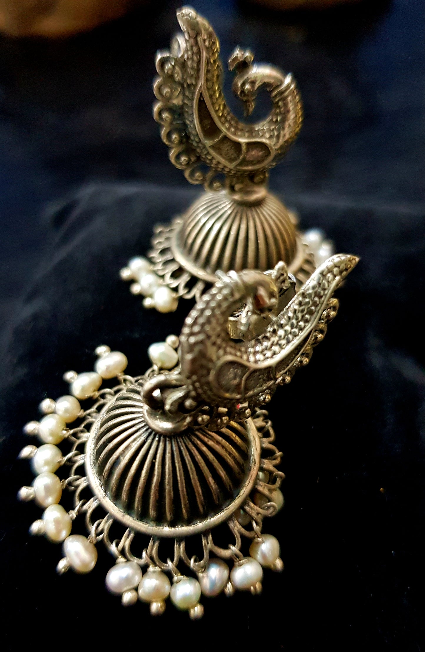 Silver peacock jhumka (earrings) with pearls