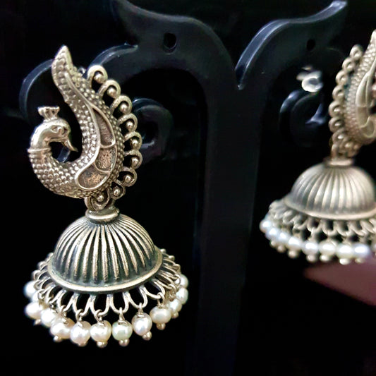 Silver peacock jhumka (earrings) with pearls