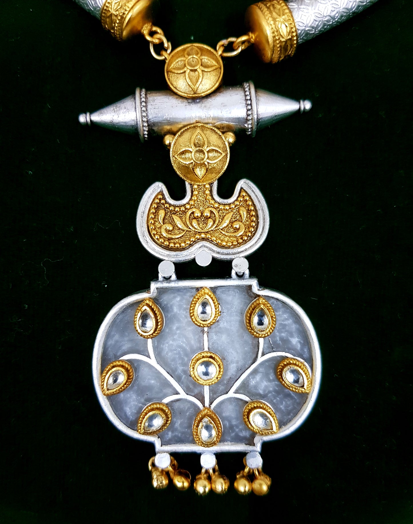 Hasli set with golden silver finish, pendant with work and tribal earrings