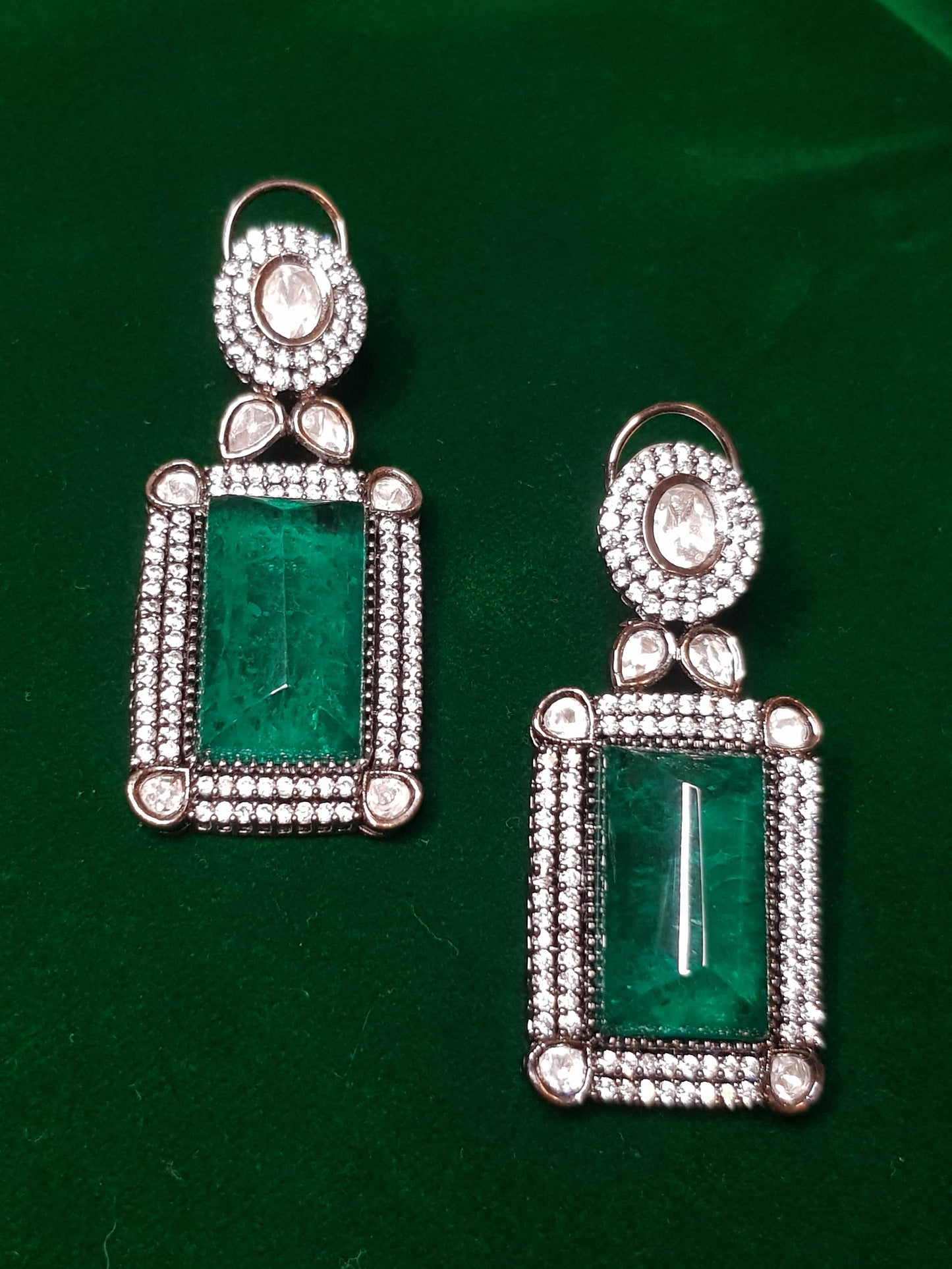 Statement earrings, big devil stone (red/green) with kundan and CZ detailing