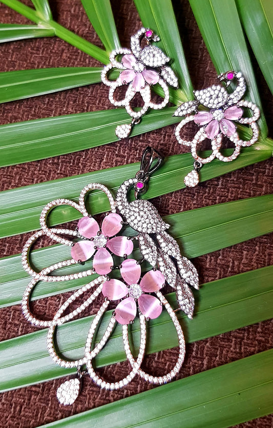 Pink peacock motif pendant and earrings