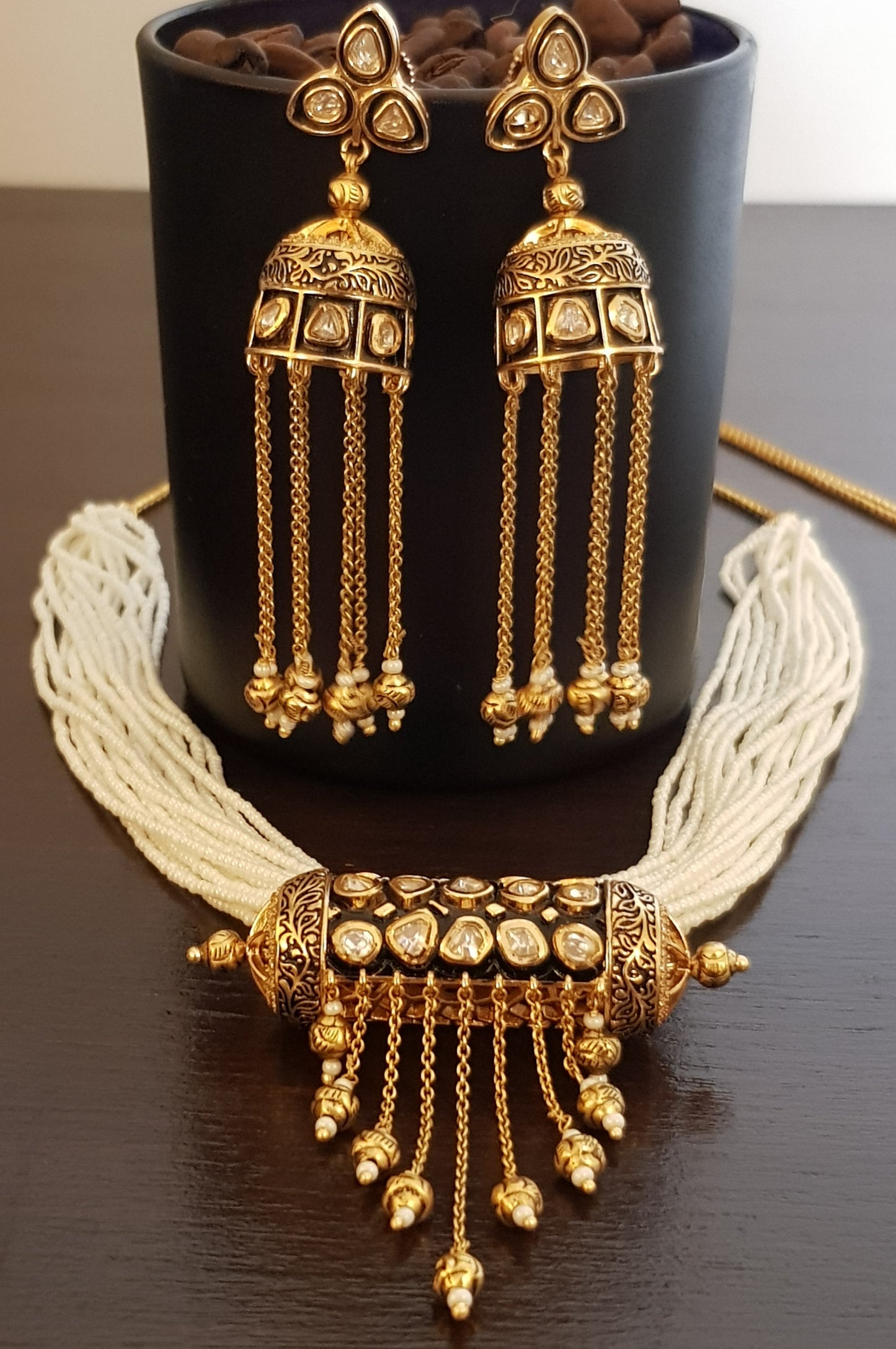 Premium quality Gold Finish Kundan Pendant (Damru) pearl ladi and earrings (Jhumki) with Gold Hangings