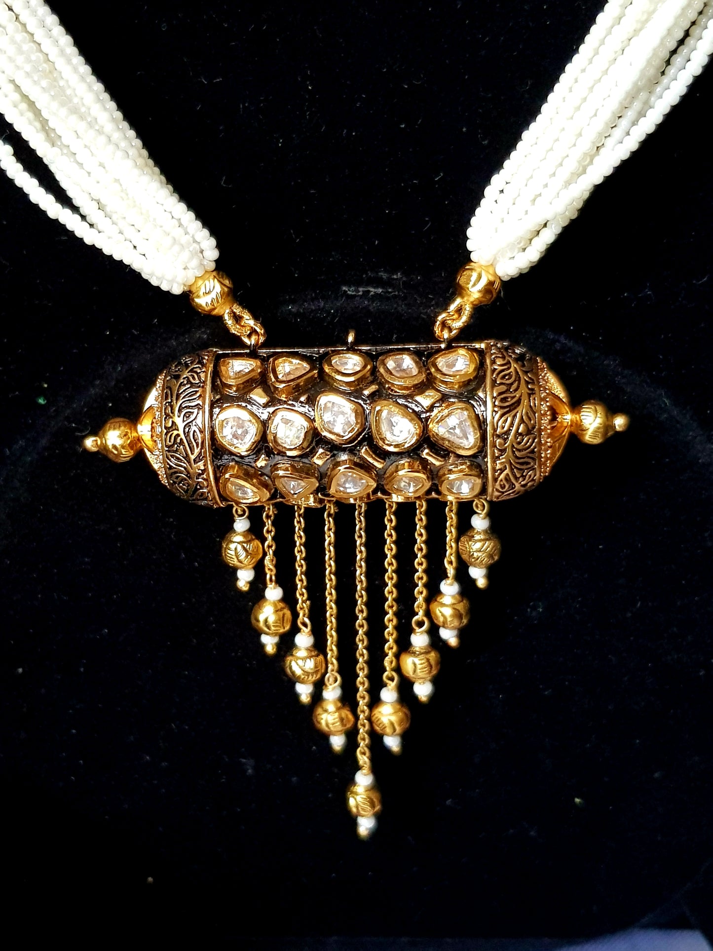 Premium quality Gold Finish Kundan Pendant (Damru) pearl ladi and earrings (Jhumki) with Gold Hangings