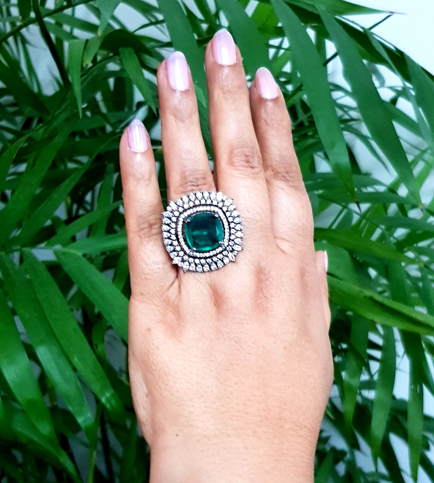 Antique finish ring, big emerald/topaz stone in the center with CZ detailing