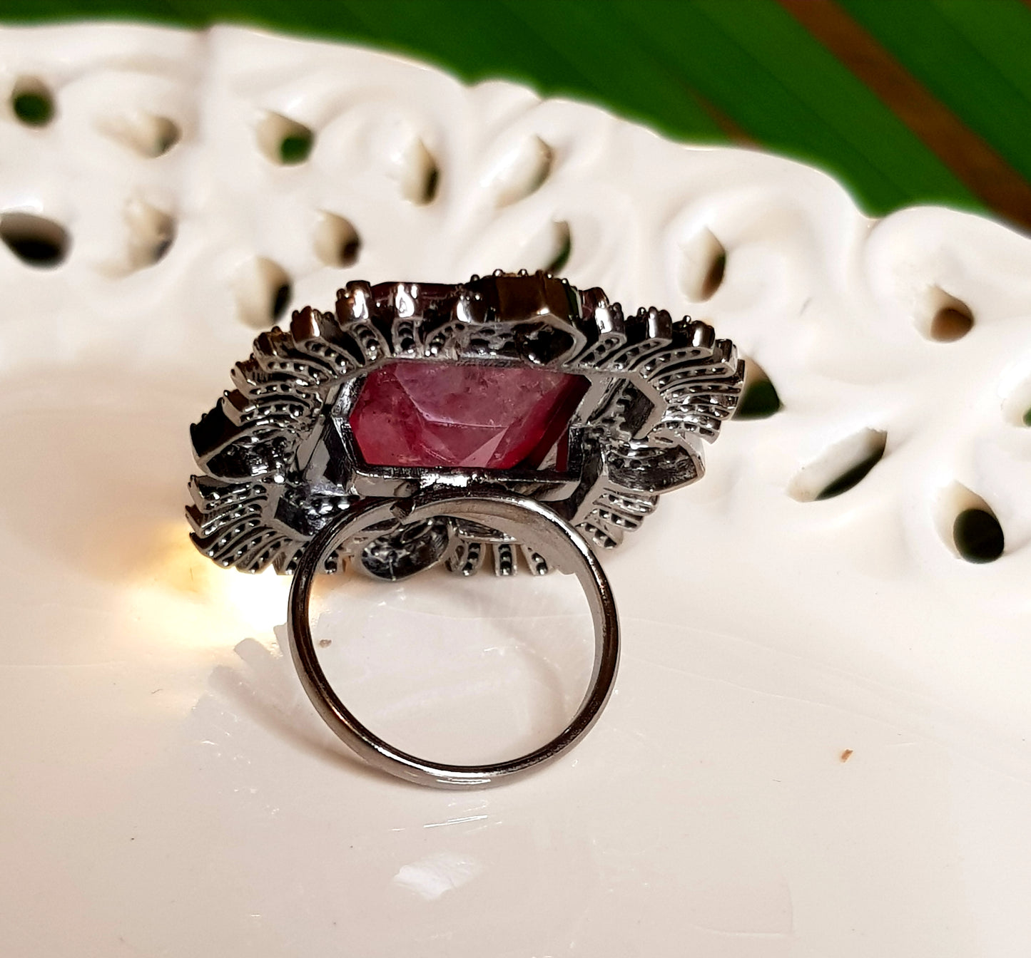 Antique finish ring, big ruby stone in the center with CZ detailing